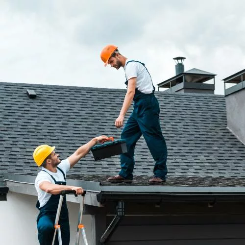 Two Men Repairing A Roof | Ellijay Roofing